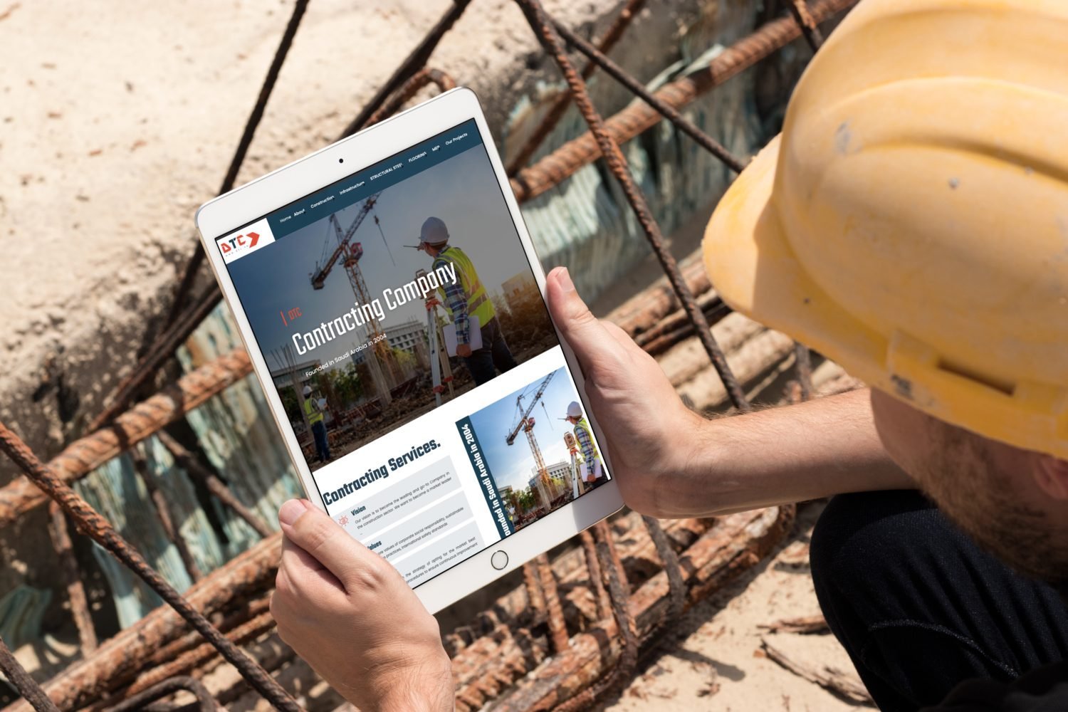DTC website on an iPad held on a construction site